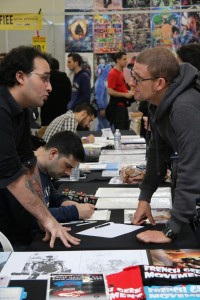 Les artistes travaillent sur le stand du French Geek Movement du Herofestival Grenoble